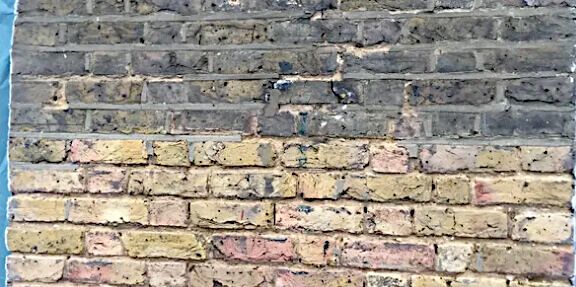 Cleaning dirt from brickwork